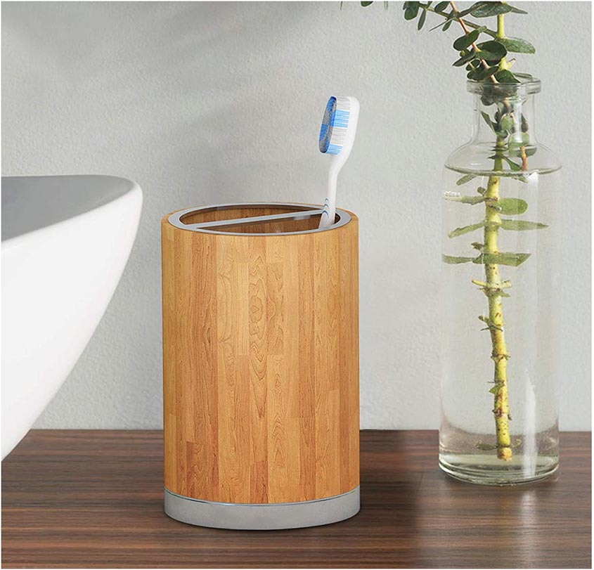 Round wooden toothbrush holder.