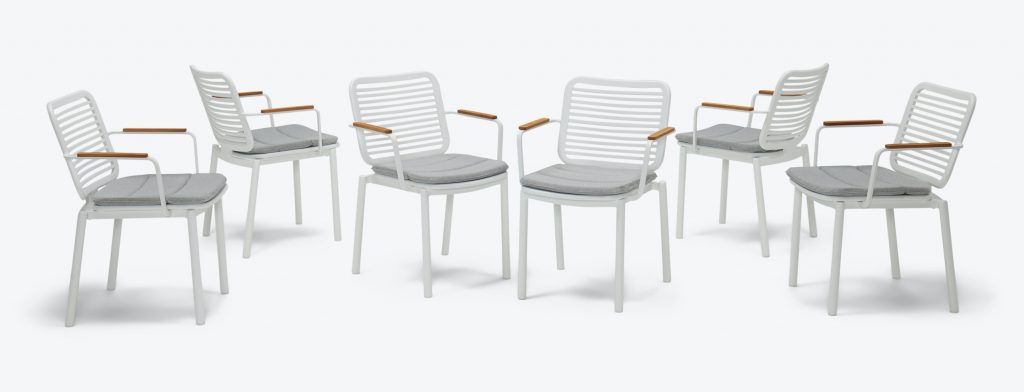 patio furniture dining chair set with white slat back design and wooden armrests