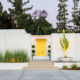 Philmer J. Ellerbroek architectural home with yellow door and white brick