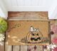 Peanuts Snoopy pumpkin doormat