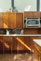 wood cabinetry in MCM kitchen