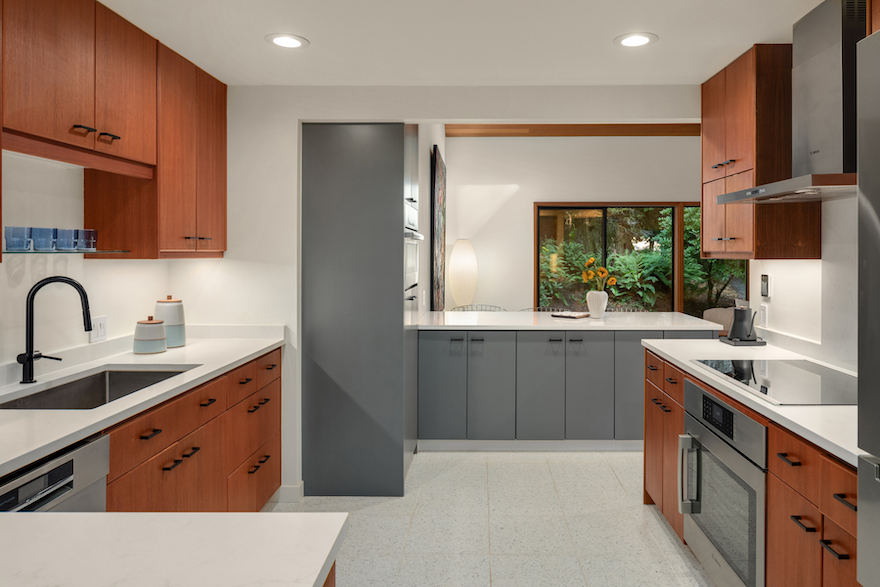 gray cabinetry in Modernous updated kitchen with original teak cabinetry