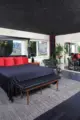 black bedroom with view to Ojai hills in former Johnny Cash home