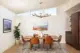 dining room with clerestory window and leather dining chairs