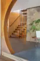 floating staircase between levels in renovated 1971 Oregon ranch house