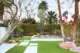 raised planter and concrete pavers in modern desert backyard