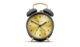 retro style alarm clock with round brass face and gray contour