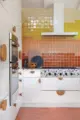 range and oven hood and double oven in renovated 1956 kitchen