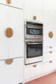 half circle wooden drawer pulls in renovated 1956 LA kitchen