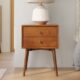 Mid Century Closed nightstand with two drawers and spindle legs