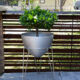 patio pod or outdoor bullet planter in silver