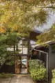 front walkway to 1958 Seattle home with view of Puget Sound