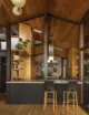 bar seating at the edge of kitchen in renovated 1958 Seattle home