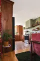 Minnesota kitchen renovation with terrazzo floors and green backsplash tile