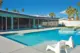 backyard pool with diving board in Las Vegas renovated MCM home