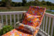 bright florals on deck lounge chair