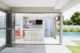 iio blue fridge in modern poolhouse