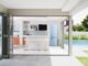 iio blue fridge in modern poolhouse